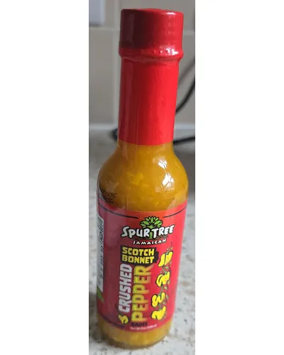 Photo of Hot Crushed Scotch Bonnet Pepper Sauce by Spur Tree Jamaican