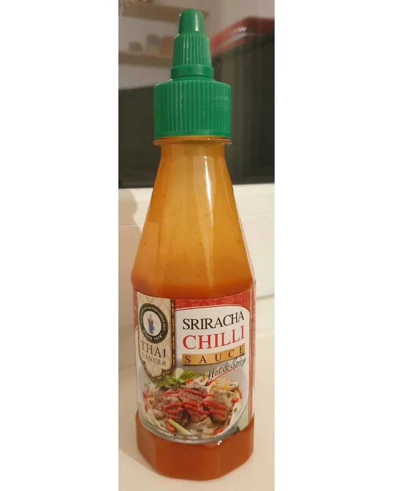 Photo of Sriracha Chilli Sauce by Thai dancer